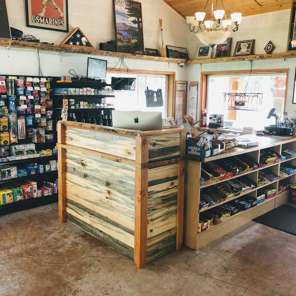 Checkout counter inside the general store with fishing tackle wall